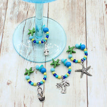 Load image into Gallery viewer, 4 Tropical Blue Green Starfish Wine Glass Charms
