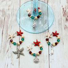 Load image into Gallery viewer, 4 Red &amp; Green Starfish Wine Charms for Christmas
