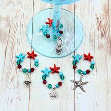 Load image into Gallery viewer, 4 Turquoise &amp; Red Starfish Christmas Wine Glass Charms
