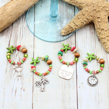 Load image into Gallery viewer, 4 Lime Green &amp; Coral Starfish Wine Glass Charms
