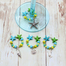 Load image into Gallery viewer, 4 Mermaid &amp; Seashell Tropical Starfish Wine Glass Charms
