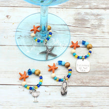 Load image into Gallery viewer, 4 Tropical Orange Starfish Wine Glass Charms
