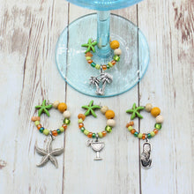 Load image into Gallery viewer, 4 Lime Green &amp; Orange Starfish Wine Glass Charms

